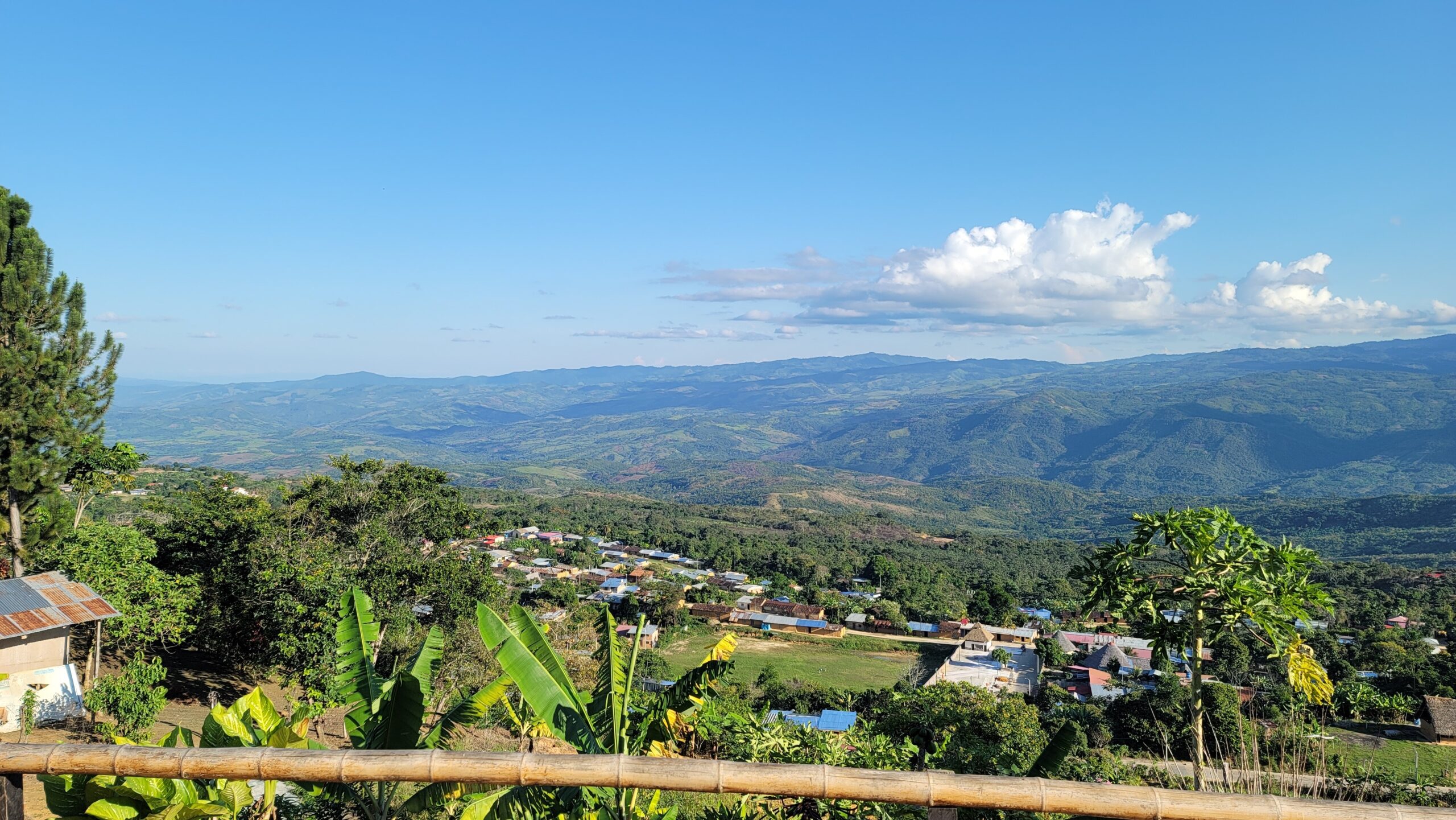 Green hills and valley below a village in the San Martín region of Peru