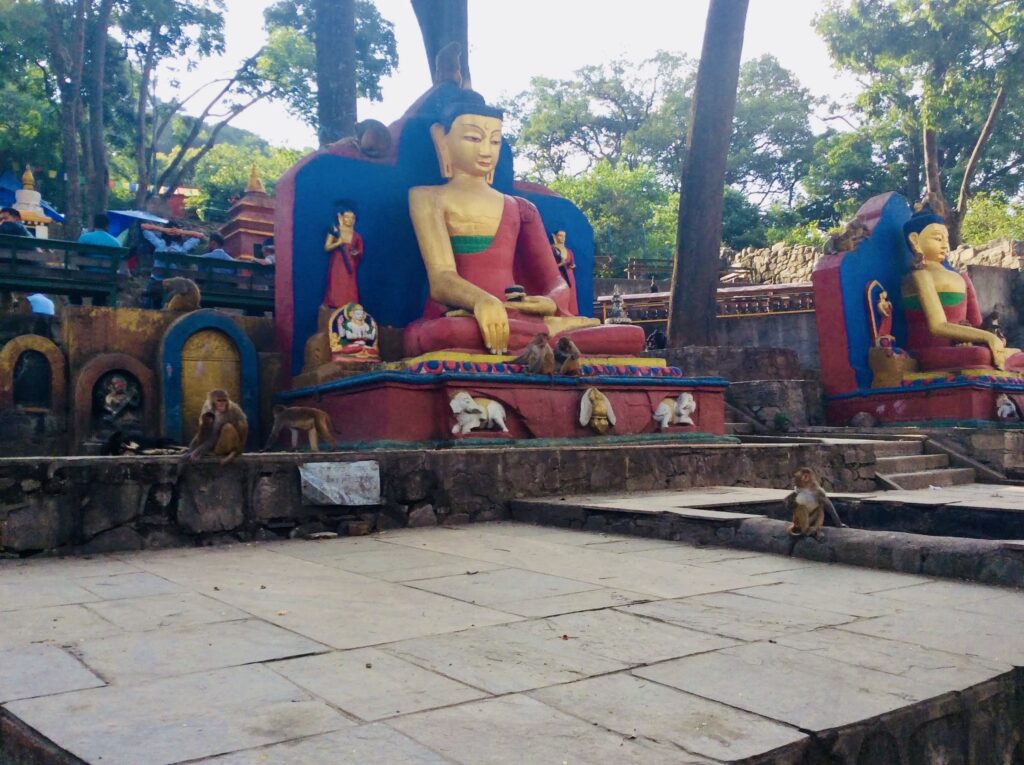Painted Buddha statues at Swayambhunath, Kathmandu